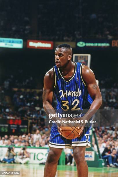 Shaquille O'Neal of the Orlando Magic handles the ball against the Boston Celtics during Game Three of the Eastern Conference Semifinals on May 3,...