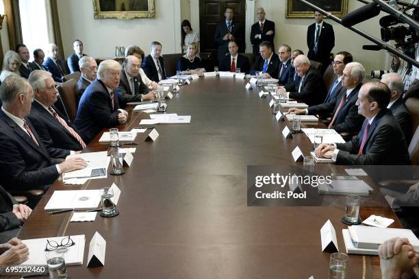 Preisdent Donald Trump attends a meeting in the Cabinet Room of the White House June 12, 2017 in Washington, DC. Also in attendence was U.S. Attorney...