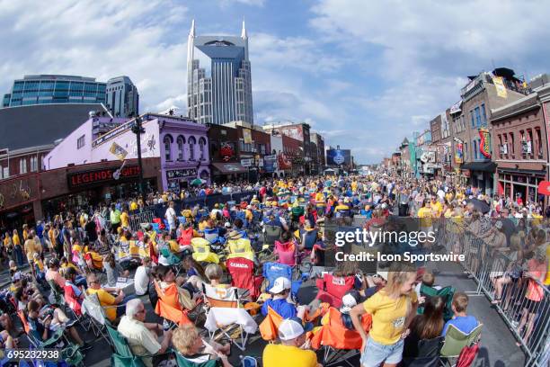 Predator fans celebrating pregame festivities on Broadway prior to game 6 of the 2017 NHL Stanley Cup Finals between the Pittsburgh Penguins and...