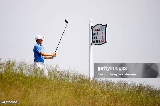 Jordan Spieth of the United States plays his shot from the fifth tee during a practice round prior to the 2017 U.S. Open at Erin Hills on June 12,...