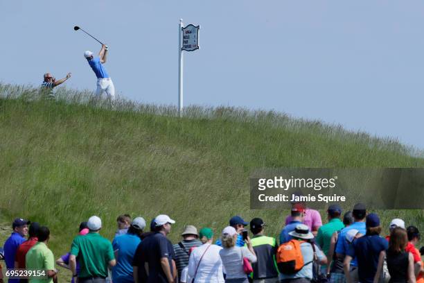 Jordan Spieth of the United States plays his shot from the fifth tee during a practice round prior to the 2017 U.S. Open at Erin Hills on June 12,...