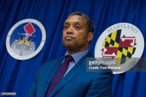 Attorney General Karl Racine and Maryland Attorney General Brian Frosh, off camera, conduct a news conference on a lawsuit they've filed against...