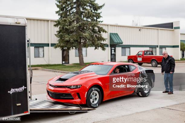 General Motors Co. Chevrolet COPO Camaro performance vehicle is driven into a trailer outside of the company's build center in Oxford, Michigan,...