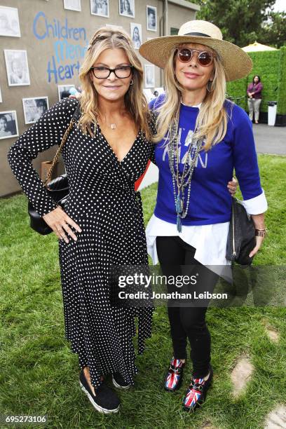 Lysa Heslov and actor Rosanna Arquette attend Children Mending Hearts' 9th Annual Empathy Rocks on June 11, 2017 in Bel Air, California.