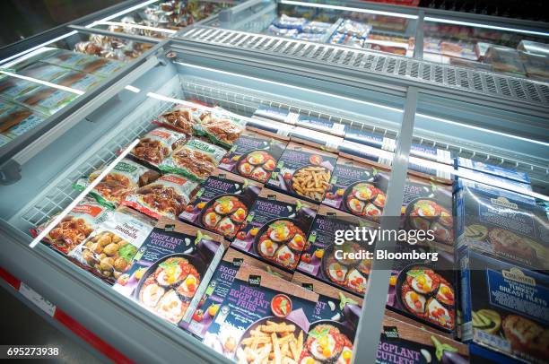 Frozen meatballs and eggplant cutlets are displayed for sale at an Aldi Stores Ltd. Location in Hackensack, New Jersey, U.S., on Thursday, June 8,...
