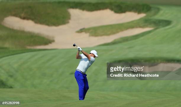 Rory McIlroy of Northern Ireland plays a shot during a practice round prior to the 2017 U.S. Open at Erin Hills on June 12, 2017 in Hartford,...