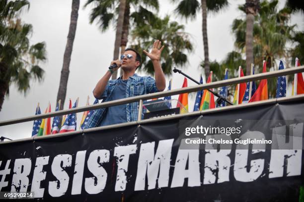 Actor/singer Cheyenne Jackson performs the national anthem at the LA Pride ResistMarch on June 11, 2017 in West Hollywood, California.