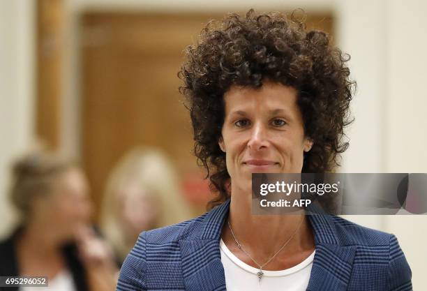 Bill Cosbys accuser Andrea Constand leaves the courtroom after closing arguments in the Cosby trial at the Montgomery County Courthouse in...