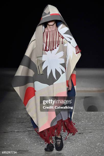 Model walks the runway at the Craig Green Show Spring Summer 2018 fashion show during London Menswear Fashion Week on June 12, 2017 in London, United...