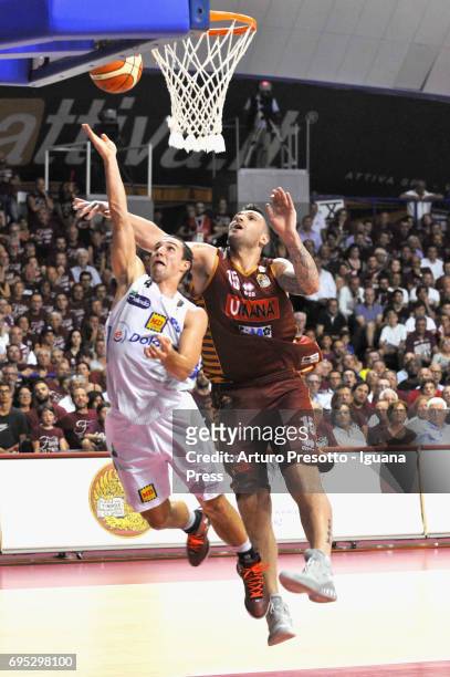 Aaron Craft of Dolomiti competes with Esteban Batista of Umana during the match game 1of play off final series of LBA Legabasket of Serie A1 between...