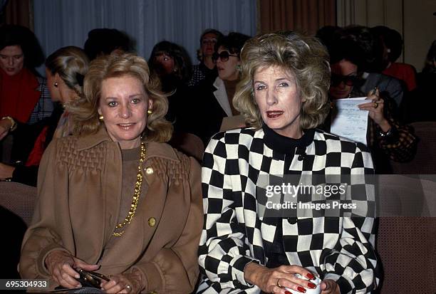 Barbara Walters and Nancy Kissinger attend the Bill Blass Spring 1987 runway show circa 1986 in New York City.