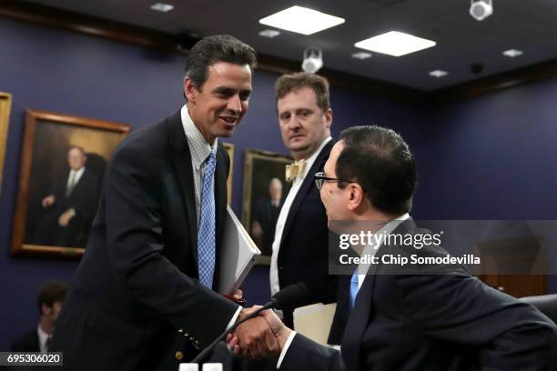 House Appropriations Committee's Financial Services and General Government Subcommittee Chairman Tom Graves greets U.S. Treasury Secretary Steven...