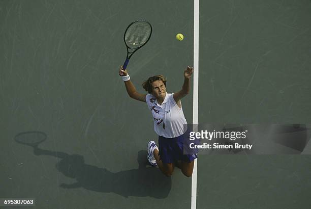 Iva Majoli of Croatia serves to Rachel McQuillan during their Women's Singles first round match of the United States Open Tennis Championship on 31...