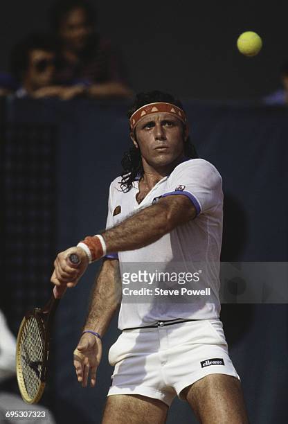 Guillermo Vilas of Argentina makes a backhand return against Mats Wilander of Sweden during their Men's Singles Final match at the French Open Tennis...