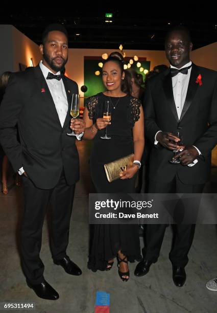 Ndaba Mandela, Soumiya Pereira and Bah-Pna Dahane attend the UNAIDS Gala during Design Miami / Basel 2017 on June 12, 2017 in Basel, Switzerland.