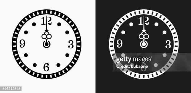 midnight on clock icon on black and white vector backgrounds - clock hands white stock illustrations