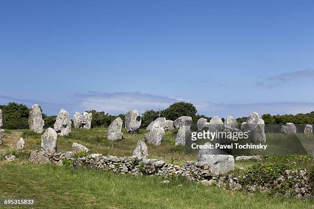 famous carnac site of 10,000 neolithic stones - carnac stock pictures, royalty-free photos & images