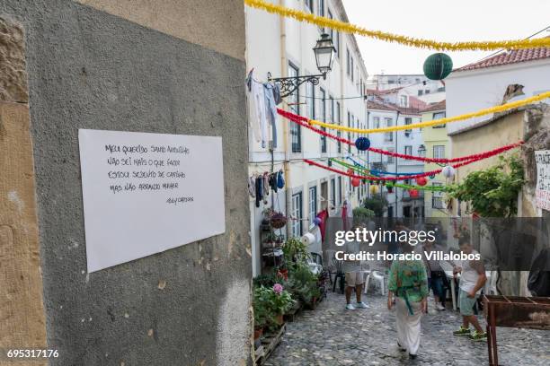 Informal poem to Santo Antonio in the old quarter of Mouraria on June 12, 2017 in Lisbon, Portugal. Mouraria fills up with food and drink stalls...