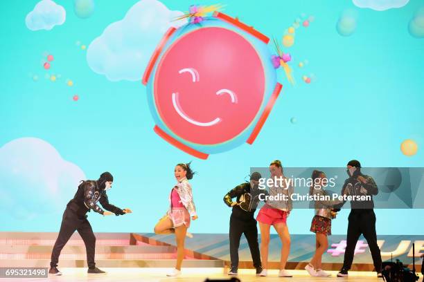 Dancers perform on stage during the Ubisoft E3 conference at the Orpheum Theater on June 12, 2017 in Los Angeles, California. The E3 Game Conference...
