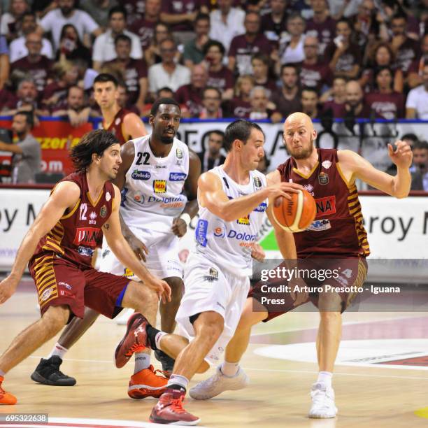 Dustin Hogue and Aaron Craft of Dolomiti competes with Hrvoje Peric and Ariel Filloy of Umana during the match game 2 of play off final series of LBA...