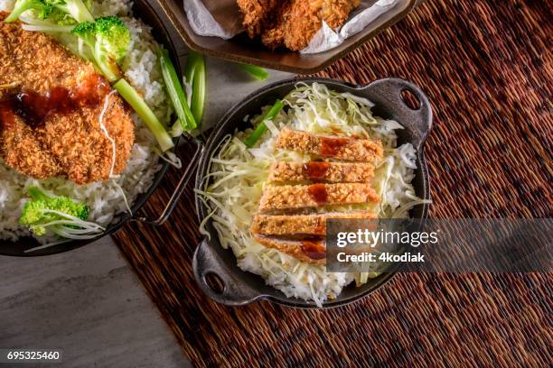 panko crusted crispy pork cutlets over steamed rice - fried stock pictures, royalty-free photos & images