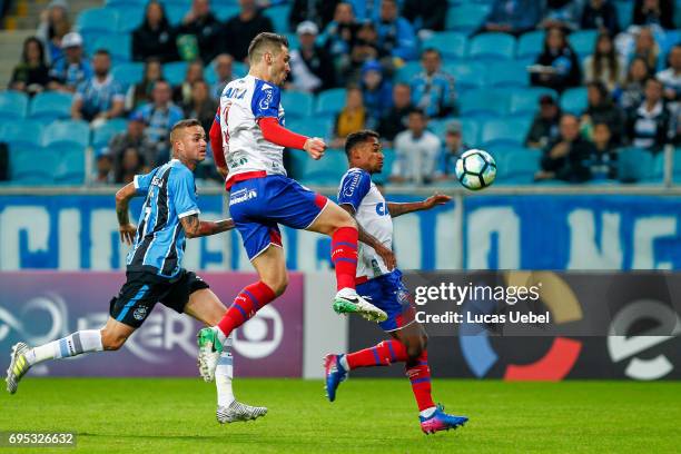 Luan of Gremio battles for the ball against Tiago of Bahia during the match Gremio v Bahia as part of Brasileirao Series A 2017, at Arena do Gremio...