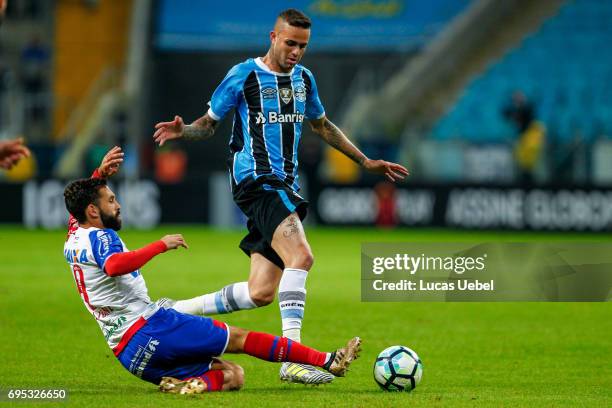 Luan of Gremio battles for the ball against Allione of Bahia during the match Gremio v Bahia as part of Brasileirao Series A 2017, at Arena do Gremio...