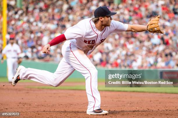 Josh Rutledge of the Boston Red Sox fields a ground ball during the second inning of a game against the Philadelphia Phillies on June 12, 2017 at...