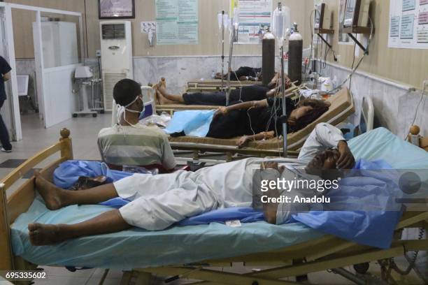 Food poisoned refugees lie on beds at East Erbil Emergency Hospital in Erbil, Iraq on June 13, 2017. Approximately 800 refugees, who had to leave...