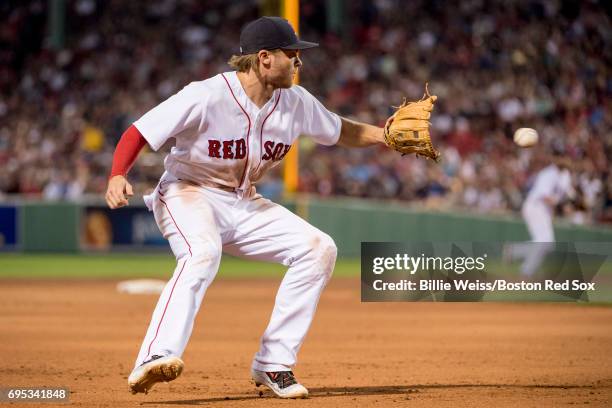 Josh Rutledge of the Boston Red Sox fields a ground ball during the seventh inning of a game against the Philadelphia Phillies on June 12, 2017 at...