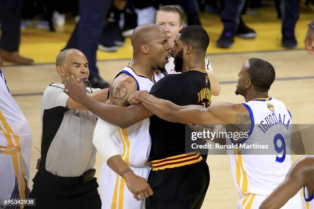 David West of the Golden State Warriors and Tristan Thompson of the Cleveland Cavaliers get into an altercation after a play in Game 5 of the 2017...