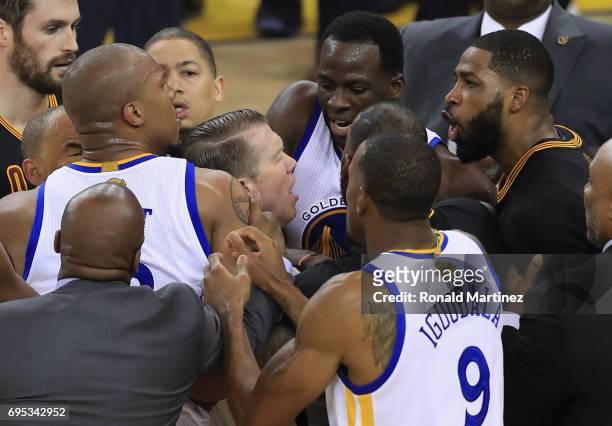 David West of the Golden State Warriors and Tristan Thompson of the Cleveland Cavaliers get into an altercation after a play in Game 5 of the 2017...