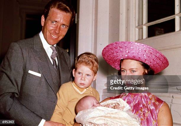 Britains Princess Margaret , Lord Snowdon , and Viscount Linley pose for a photograph with Margarets infant daughter Lady Sarah Armstrong-Jones in...