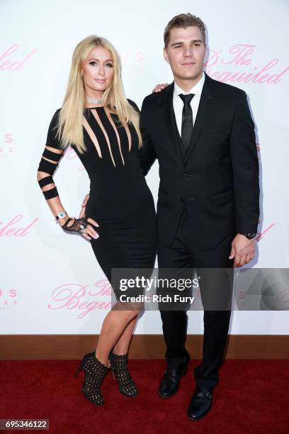 Paris Hilton and actor Chris Zylka attend the premiere of Focus Features' "The Beguiled" at the Directors Guild of America on June 12, 2017 in Los...