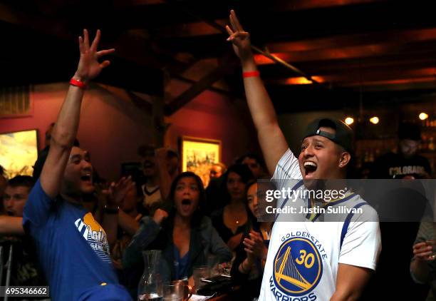 Golden State Warriors fans react as they watch game 5 of the NBA Finals between the Goldens State Warriors and the Cleveland Cavaliers during a watch...
