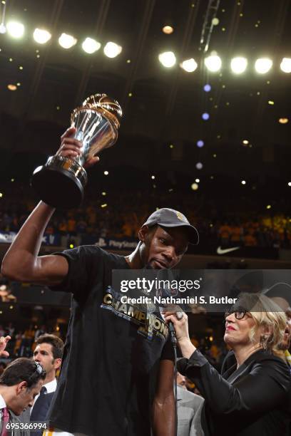 Reporter, Doris Burke interviews Kevin Durant of the Golden State Warriors after winning the Finals MVP in Game Five of the 2017 NBA Finals against...