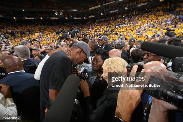Reporter, Doris Burke interviews Wanda Durant and Kevin Durant of the Golden State Warriors after winning Game Five of the 2017 NBA Finals against...