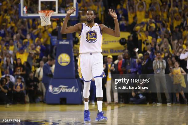 Kevin Durant of the Golden State Warriors celebrates in the final moments of their 129-120 win in Game 5 over the Cleveland Cavaliers to win the 2017...