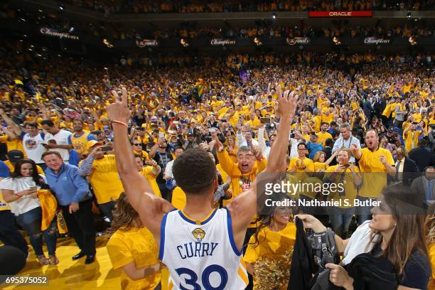 Stephen Curry of the Golden State Warriors points to the fans after winning Game Five of the 2017 NBA Finals against the Cleveland Cavaliers on June...