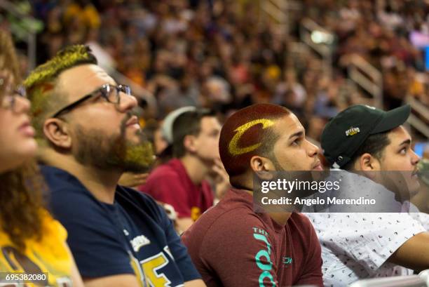 Cleveland Cavaliers fans react as they watch Game 5 of the NBA Finals between the Cleveland Cavaliers and the Golden State Warriors during a watch...