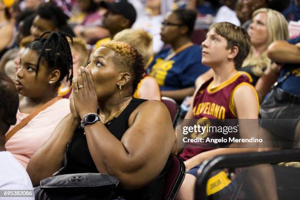 Cleveland Cavaliers fans react as they watch Game 5 of the NBA Finals between the Cleveland Cavaliers and the Golden State Warriors during a watch...