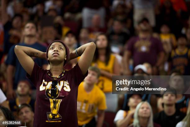 Cleveland Cavaliers fans react as they watch Game 5 of the NBA Finals between the Cleveland Cavaliers and the Golden State Warriors during a watch...