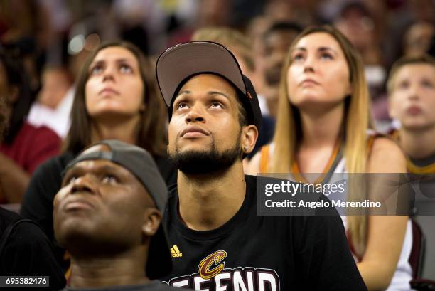 Cleveland Cavaliers fans react as they watch Game 5 of the NBA Finals between the Cleveland Cavaliers and the Golden State Warriors during a watch...