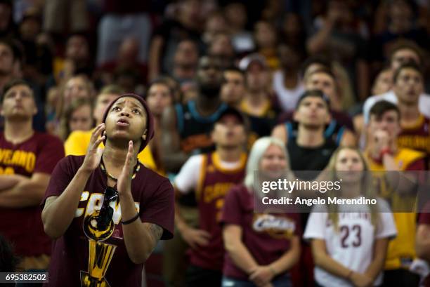 Cleveland Cavaliers fans react as they watch Game 5 of the NBA Finals between the Cleveland Cavaliers and the Golden State Warriors during a watch...