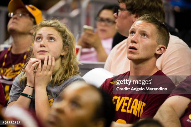 Cleveland Cavaliers fans react as they watch Game 5 of the NBA Finals between the Cleveland Cavaliers and the Golden State Warriors during a watch...