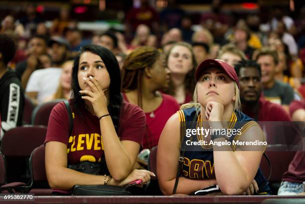 Cleveland Cavaliers fans react as they watch Game 5 of the NBA Finals between the Cleveland Cavaliers and the Golden State Warriors during a watch...