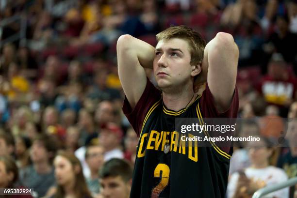 Cleveland Cavaliers fans react as they watch Game 5 of the NBA Finals between the Cleveland Cavaliers and the Golden State Warriors during a watch...