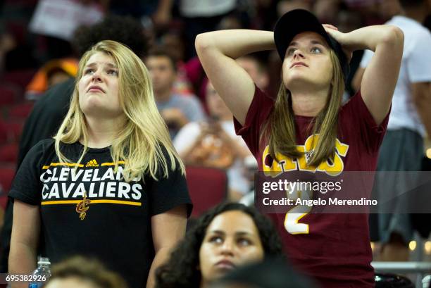 Cleveland Cavaliers fans react as they watch Game 5 of the NBA Finals between the Cleveland Cavaliers and the Golden State Warriors during a watch...