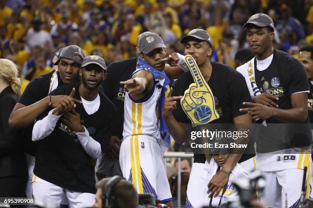 Patrick McCaw and the Golden State Warriors celebrate after defeating the Cleveland Cavaliers 129-120 in Game 5 to win the 2017 NBA Finals at ORACLE...