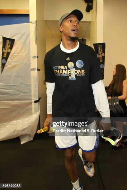 David West of the Golden State Warriors celebrates in the locker room after winning the NBA Championsip in Game Five of the 2017 NBA Finals against...